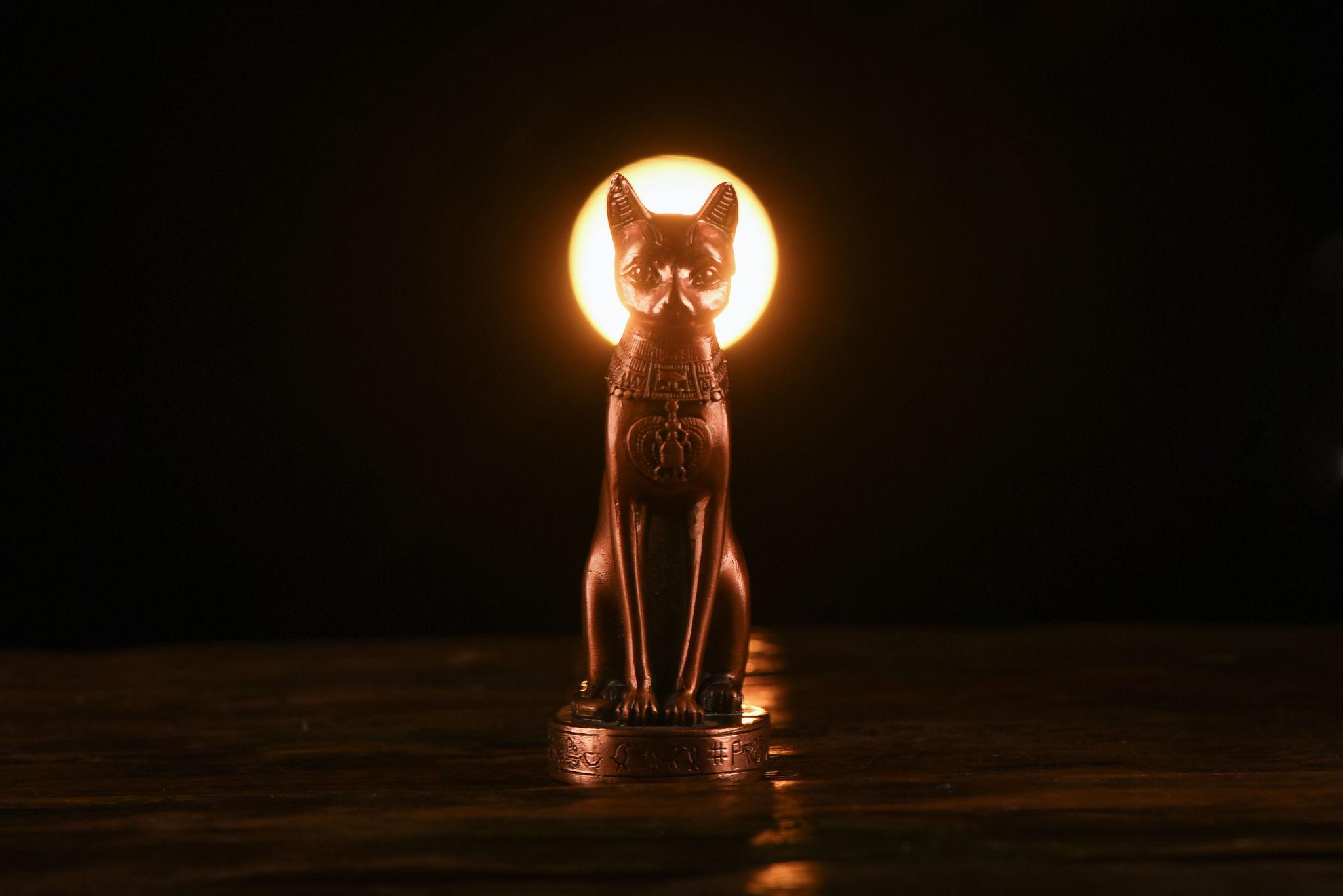 Bronze Egypt cat.
Ancient relic.
Bastet statue.
Egyptian cat goddess Bastet.
Bastet sculpture ancient Egypt.